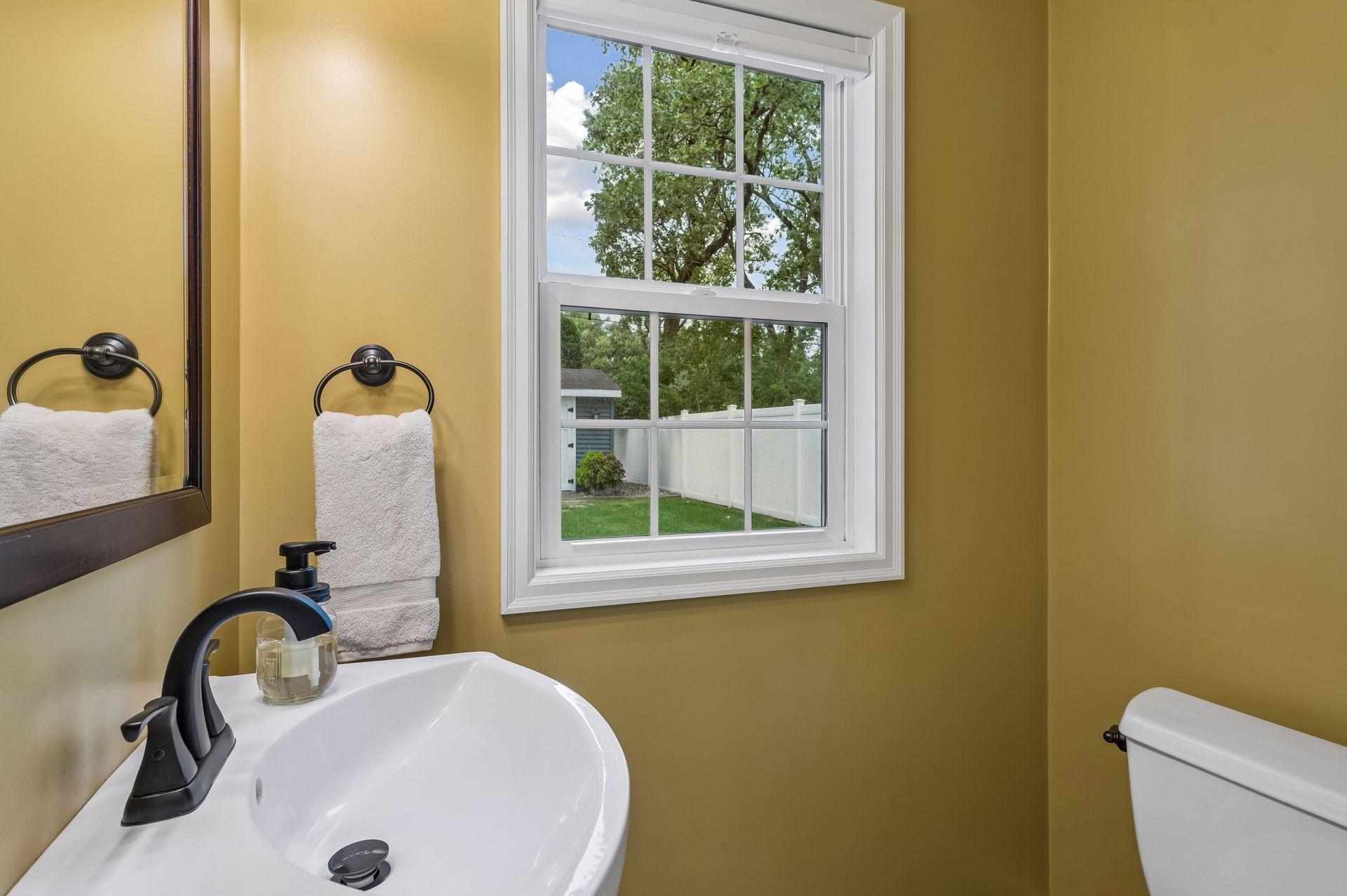 A powder room half bath on the main level