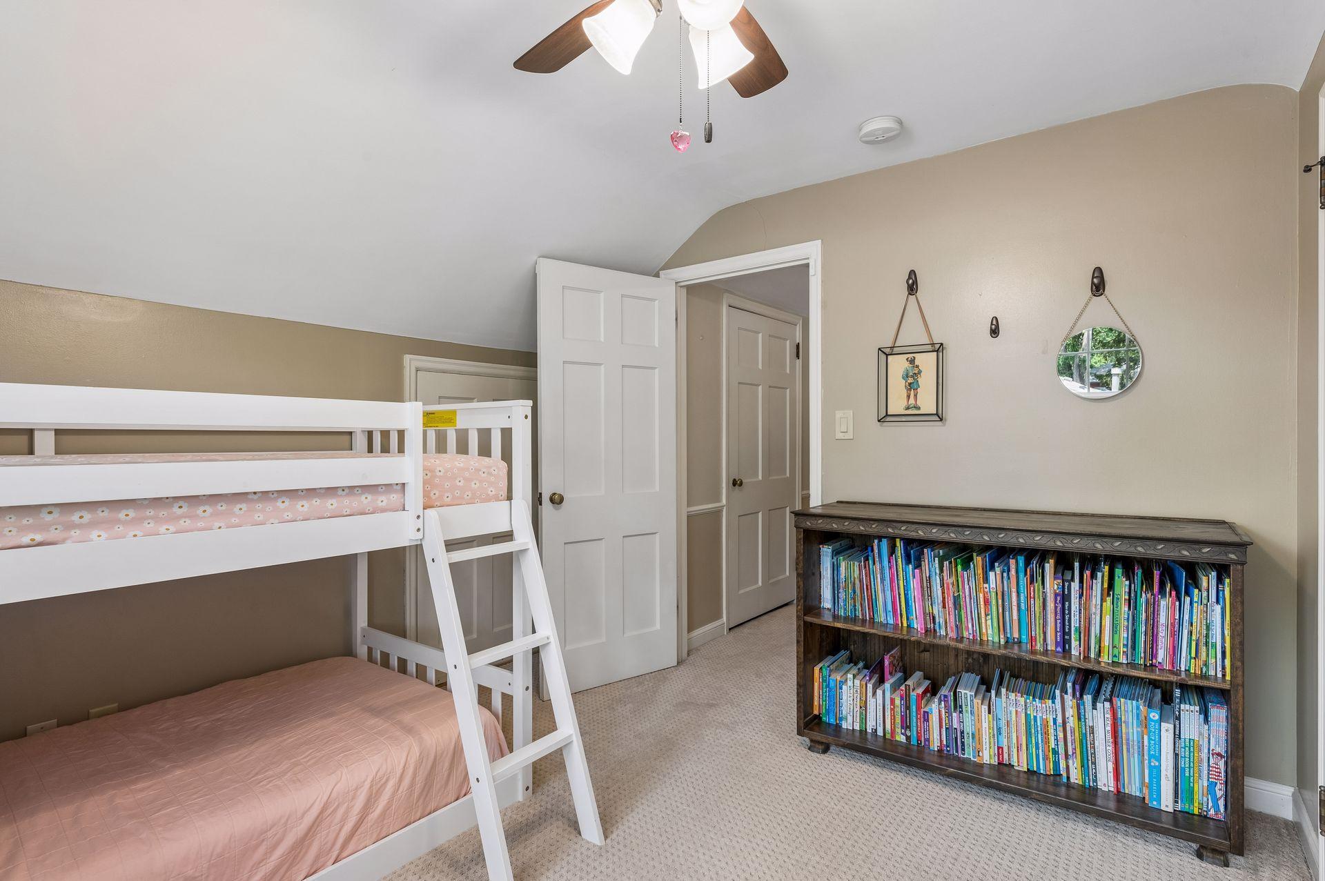 Upper level bedroom with a spacious closet
