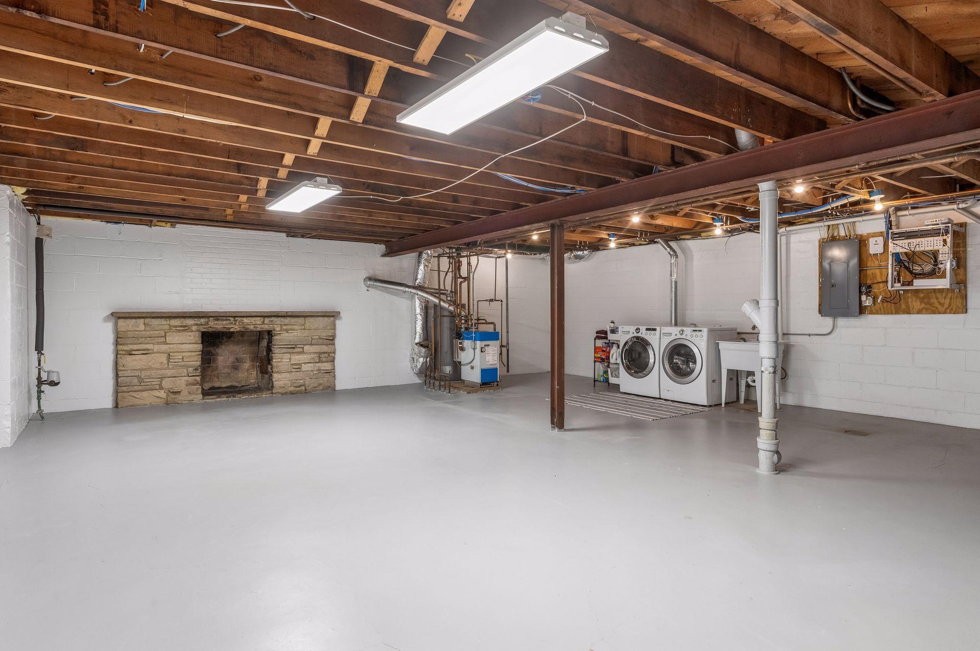 Lower level is ready for your plans - and has plenty of space to add another bedroom and bathroom AND keep laundry and a TV room area