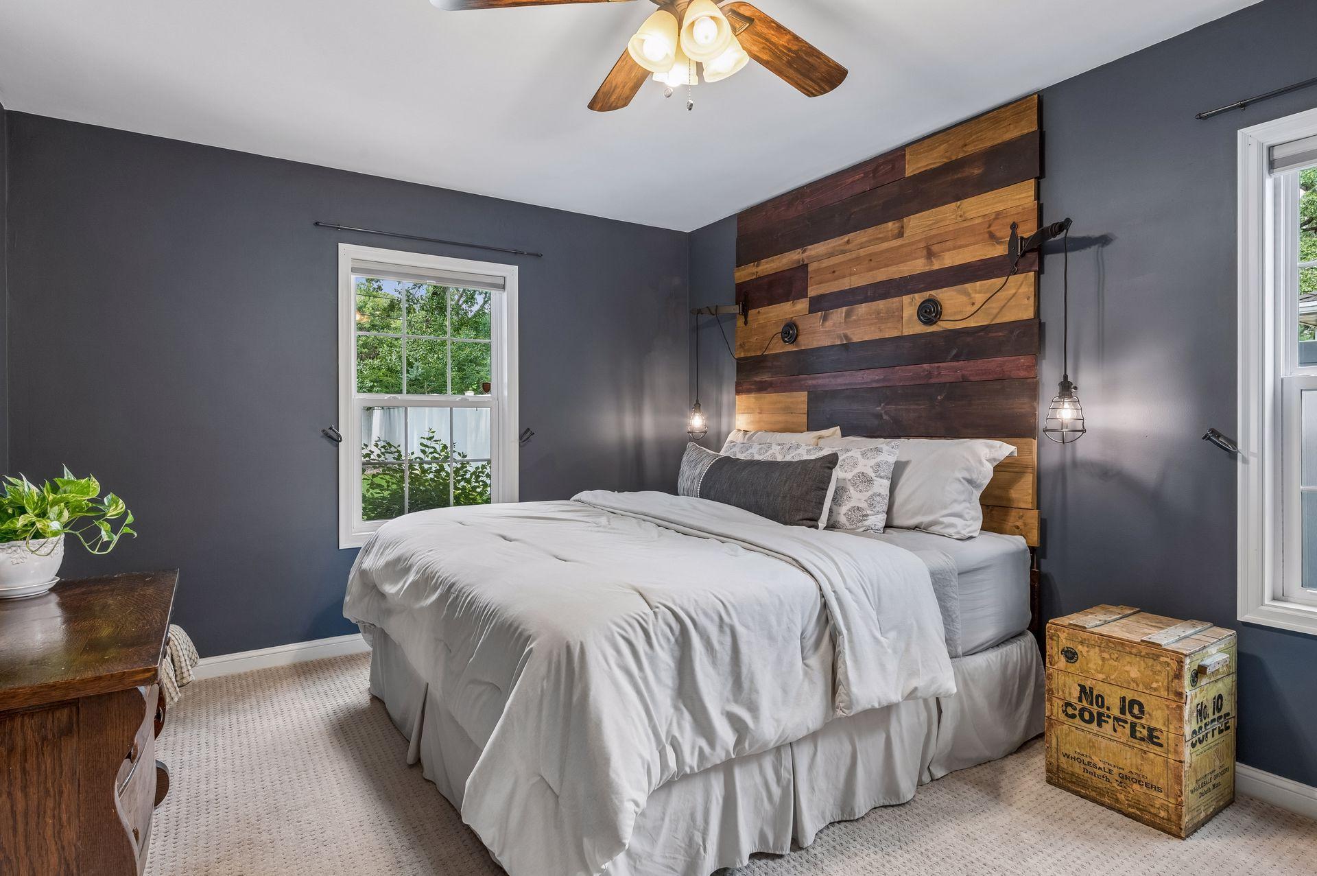 A spacious bedroom on the main level with a large closet