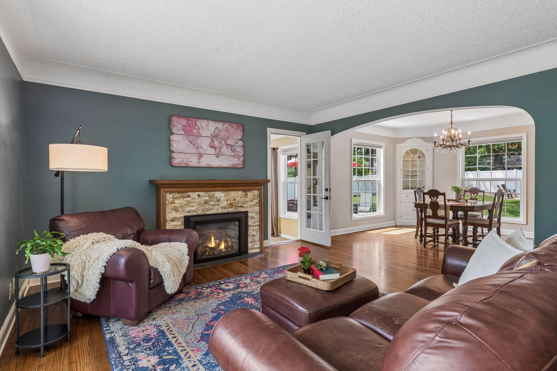 Cozy up with your gas fireplace and enjoy your separate formal dining room with original built-ins and chandelier