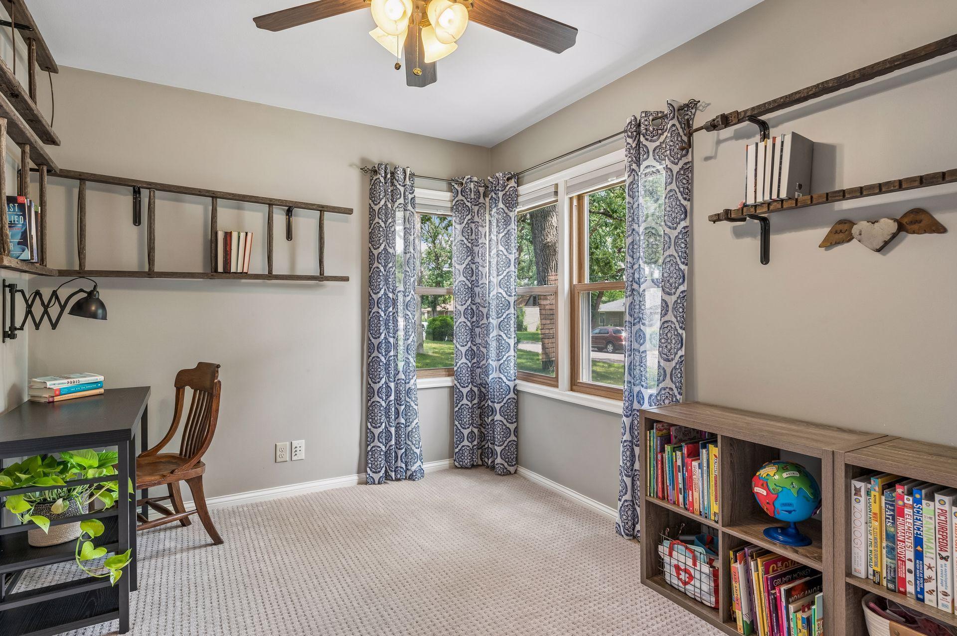 The front bedroom is a flex space that is currently is used as a playroom and office