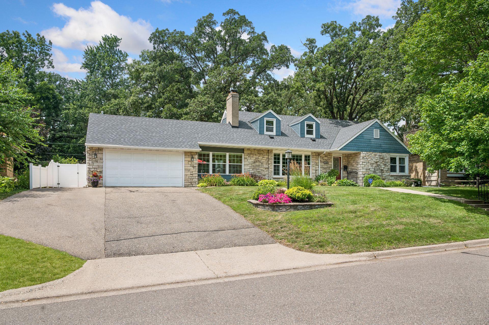 Curb appeal is 10/10 and you have extra space to park cars or toys with the expanded driveway