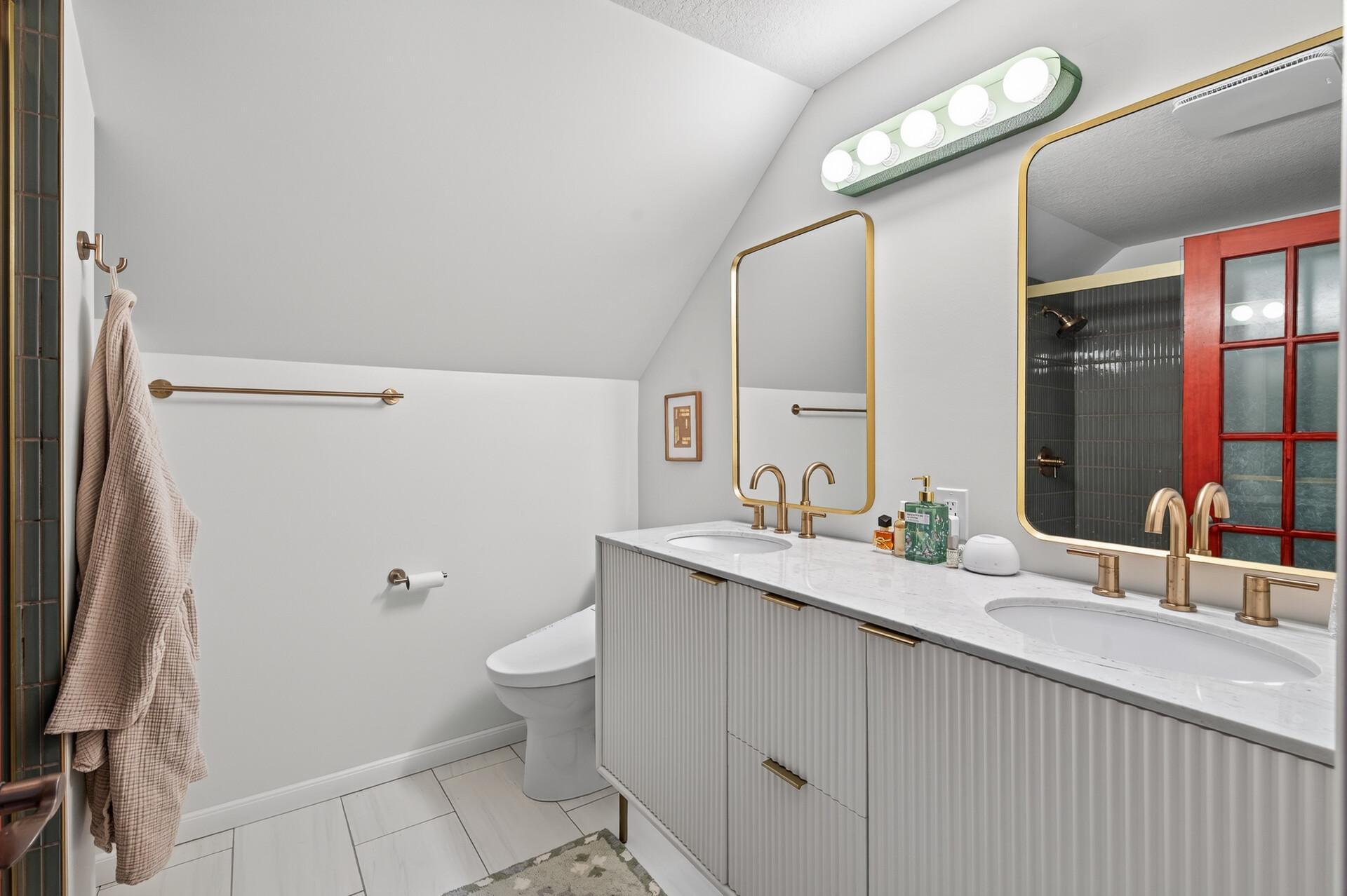 Custom tiled bath w/ double vanity