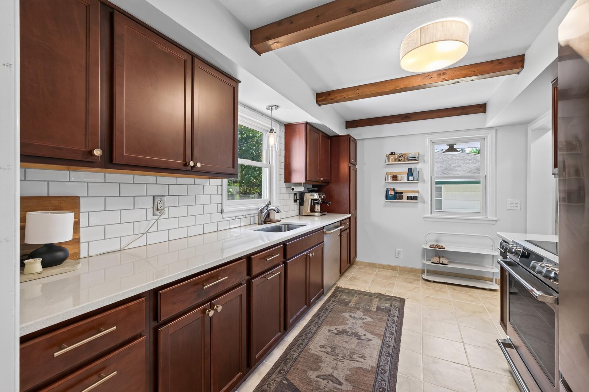 Quartz countertops, beamed ceiling