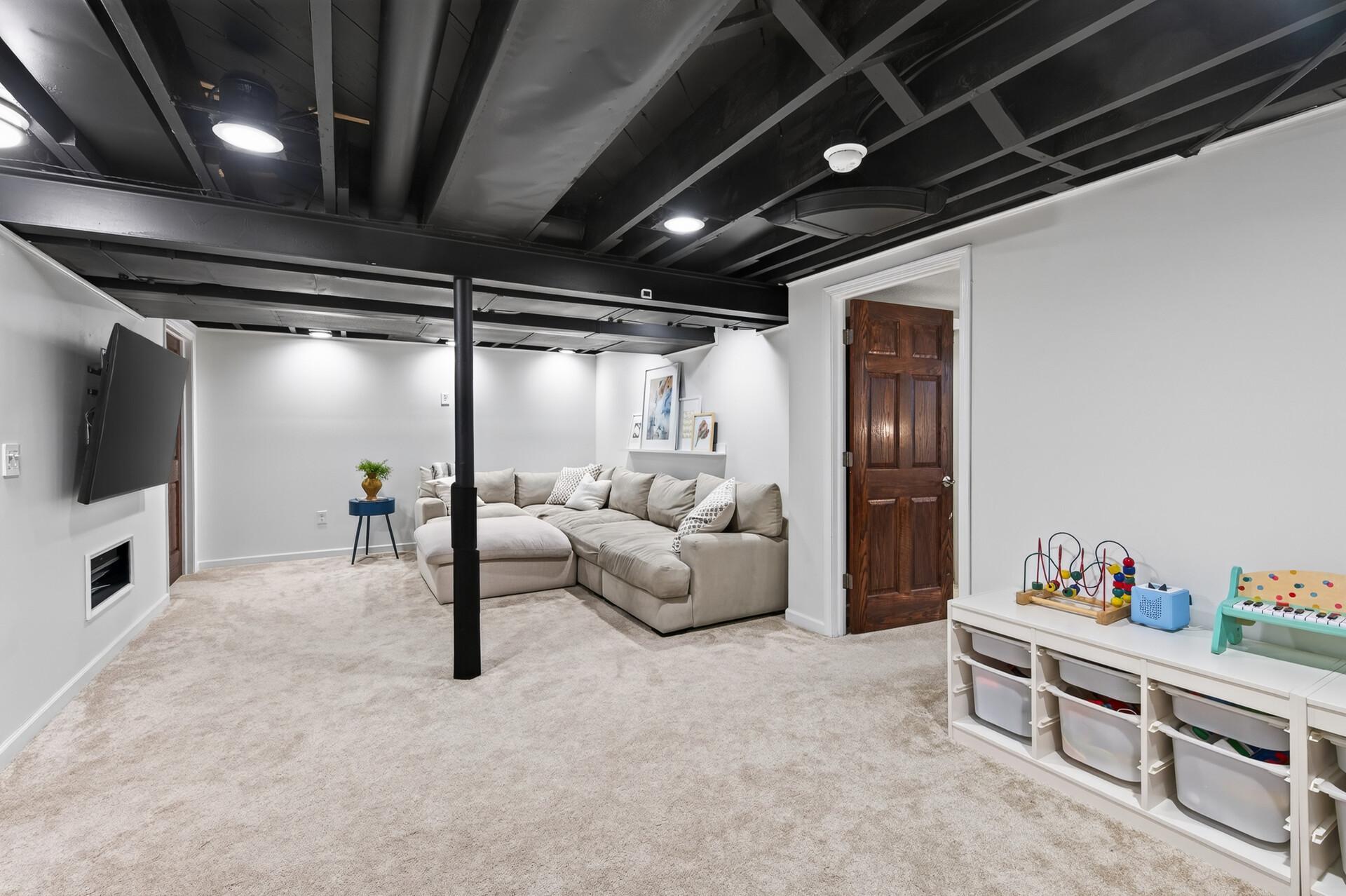 Lower level with newer carpet and freshly painted