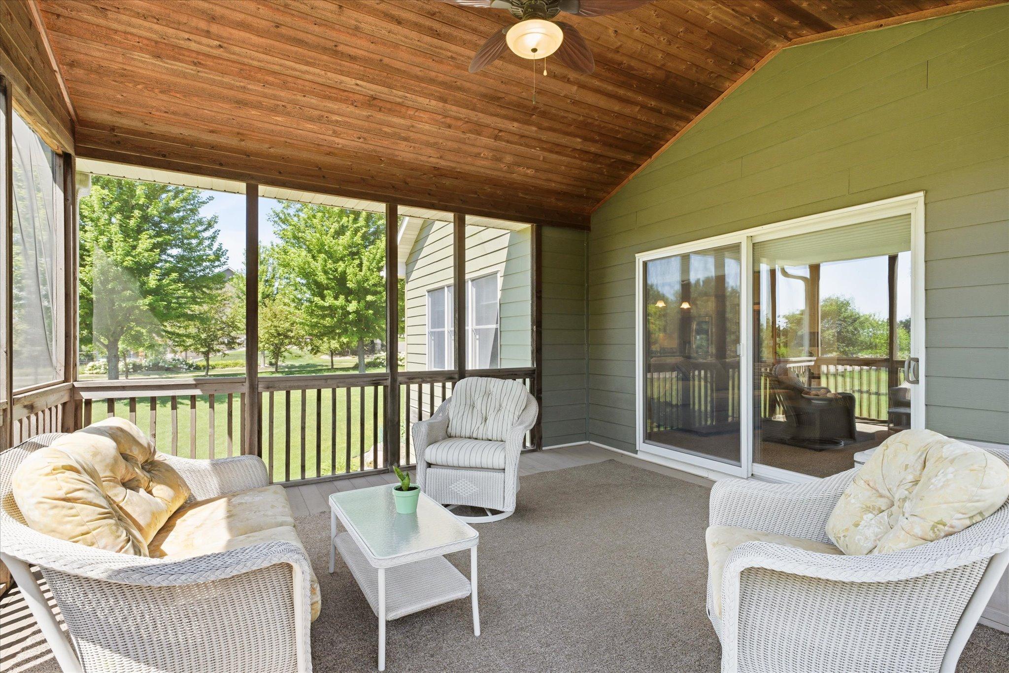 Enjoy morning coffee or evening sunsets from the inviting screened porch, thoughtfully constructed with insulated ceiling system to allow for an easy future conversion to a four-season living space.