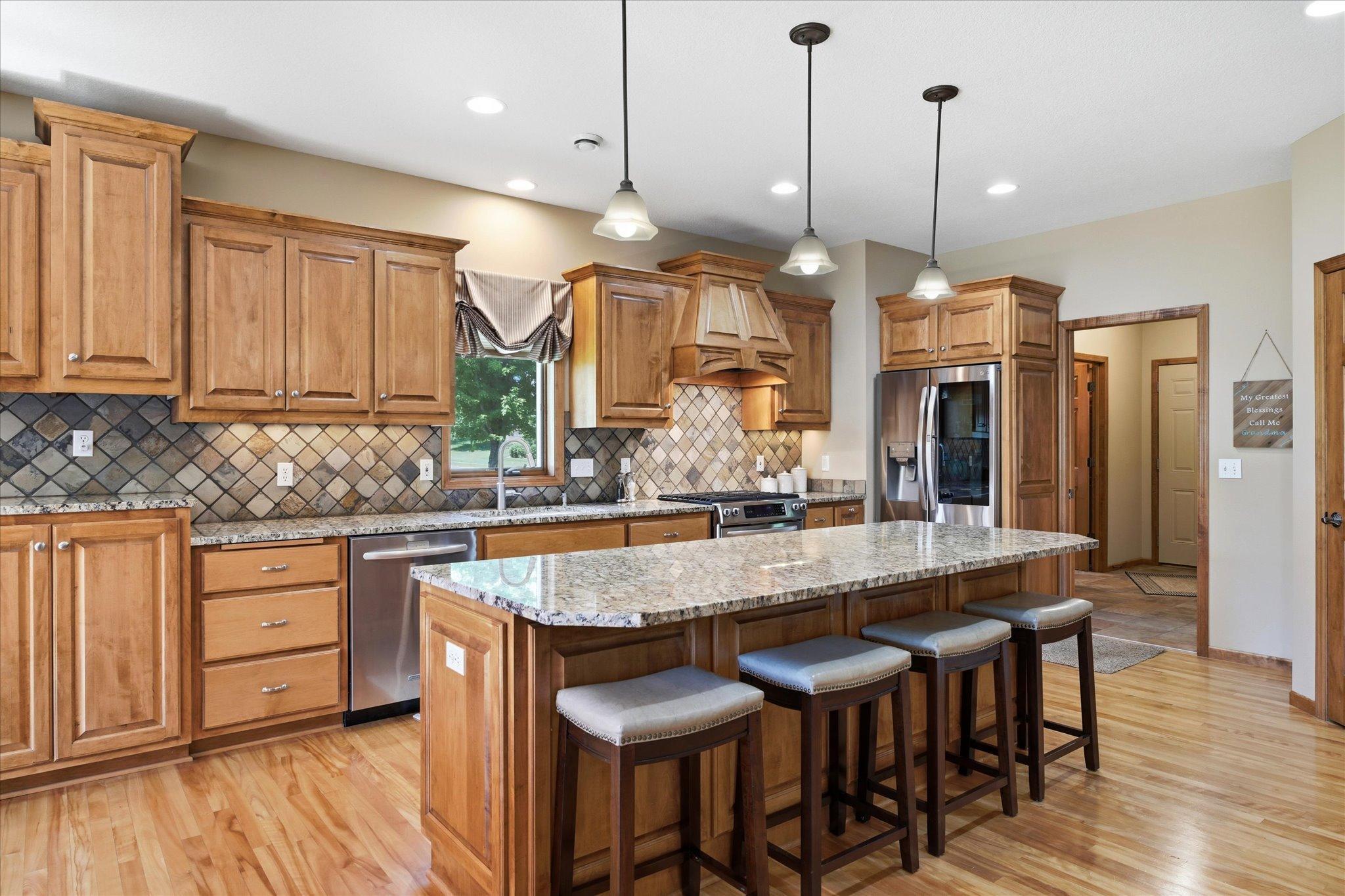 Thoughtfully designed kitchen offers under-cabinet lighting, and dedicated switched outlets above the cabinetry, making it easy to add accent lighting.