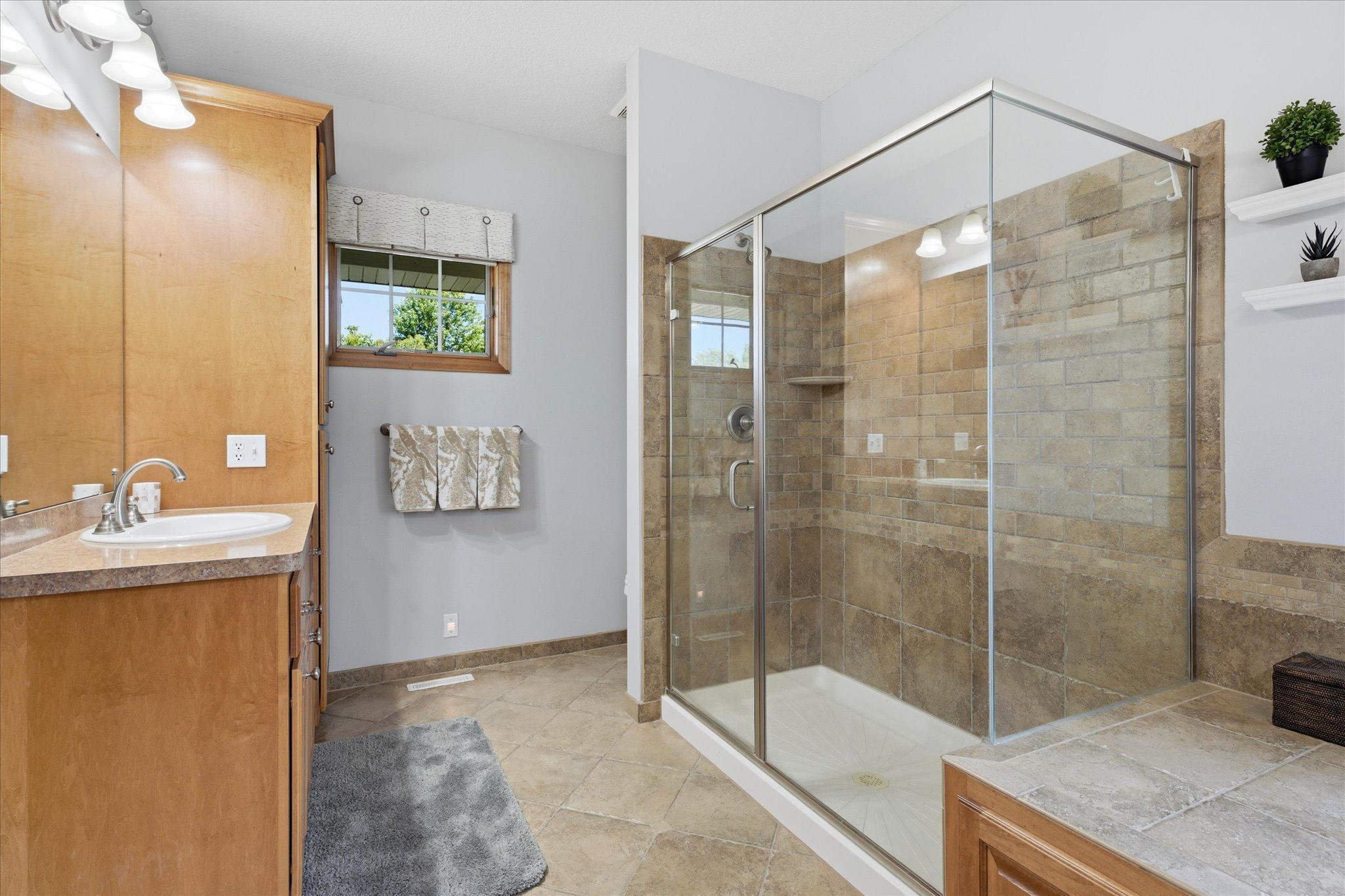 Designed for everyday luxury, the ensuite offers dual 42-inch comfort-height vanities.