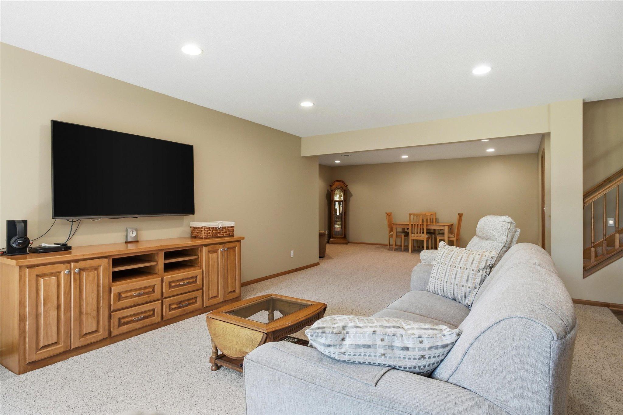 Built-in entertainment center provides an attractive focal point with ample storage for electronics, media, and décor.