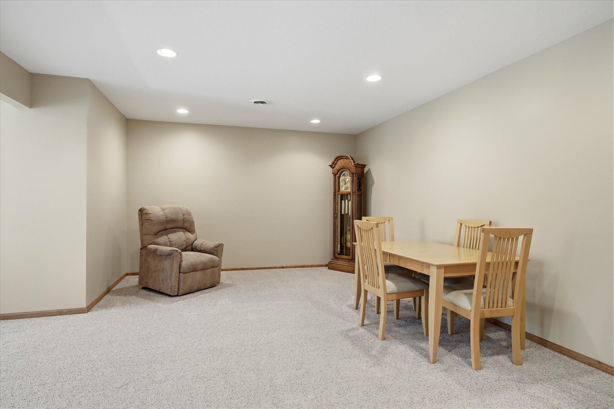 Expansive recreation room provides endless possibilities with plenty of space for a game area, home gym, hobby room, or additional gathering space.