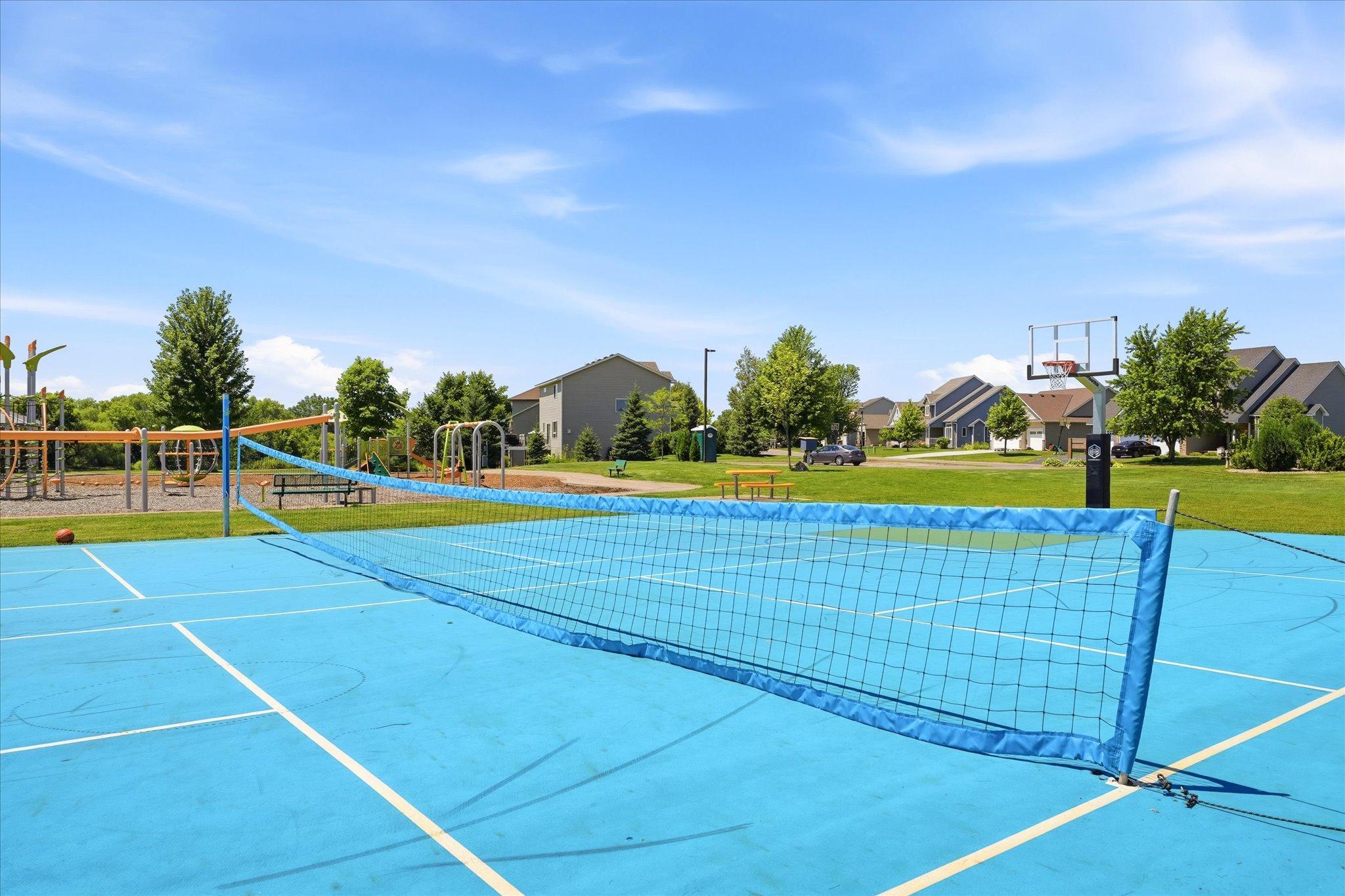 Enjoy an active lifestyle with a multi-use sport court designed for basketball, volleyball, pickleball, and other recreational activities.