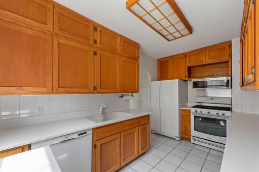 Kitchen with lots of cabinetry and storage L Side