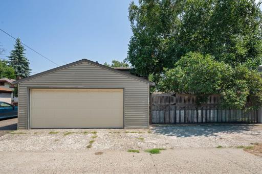 Detached 2 car garage with lots of storage.