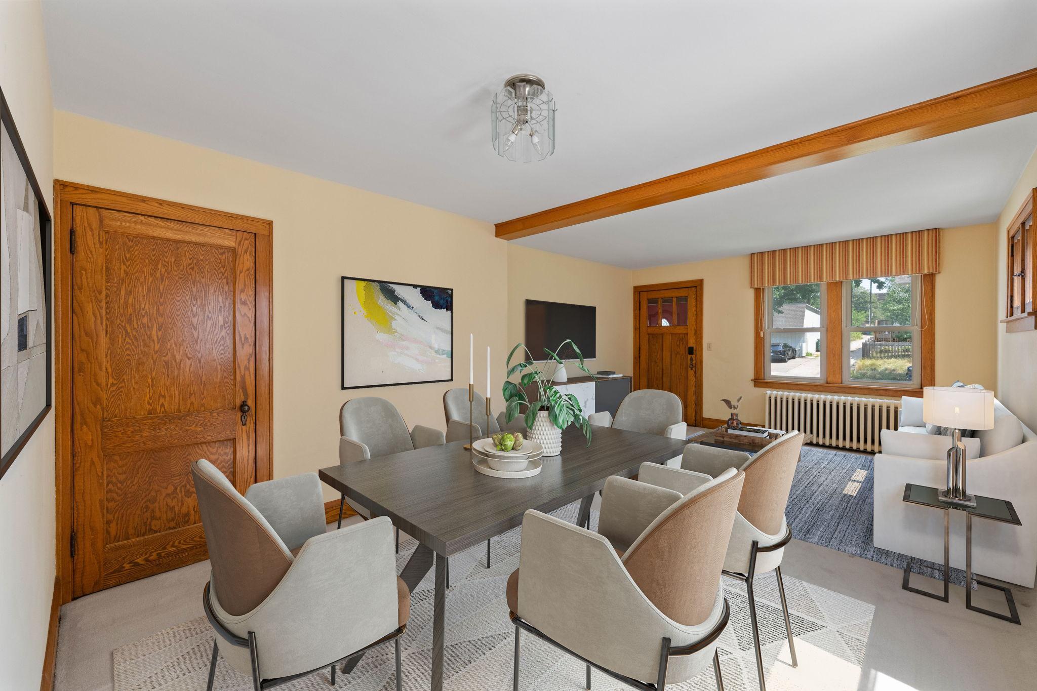 Welcome to 4612 Bloomington Ave S! Main level dining. Virtually Staged