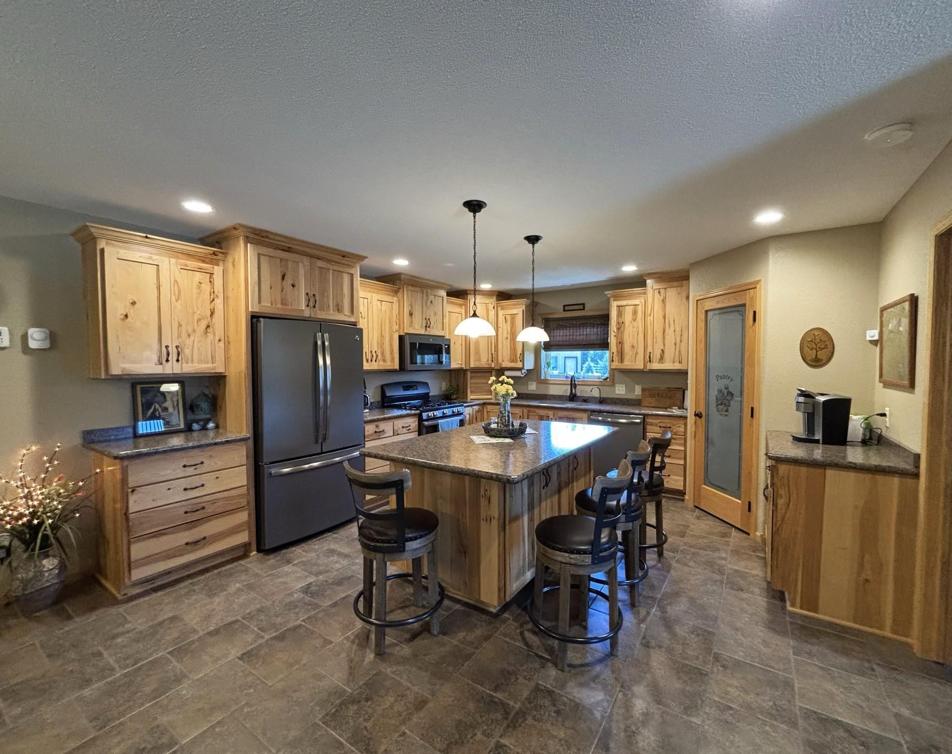 Hickory cabinets make this a stand out kitchen