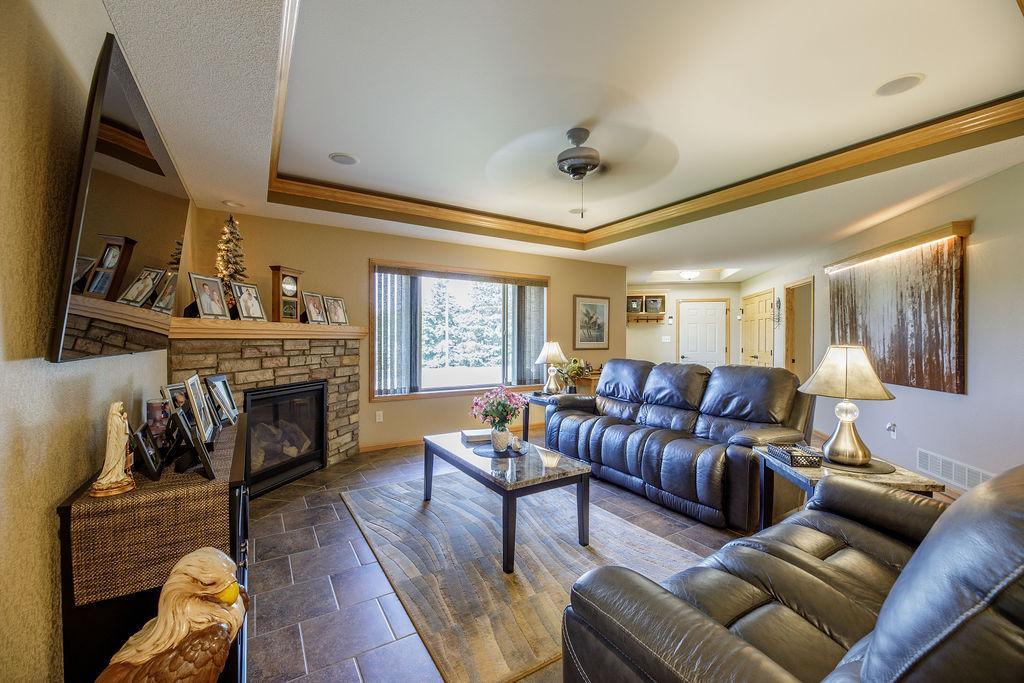 Living room has gas fireplace to warm you in the winter
