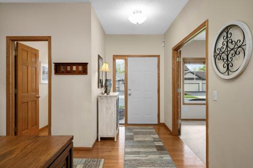 Hardwood floors in the foyer and kitchen/dining areas.
