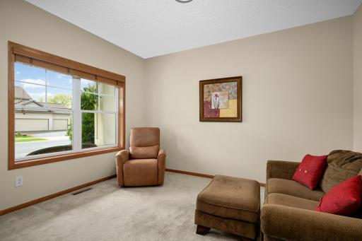 Front office with french doors and a view of the front yard.
