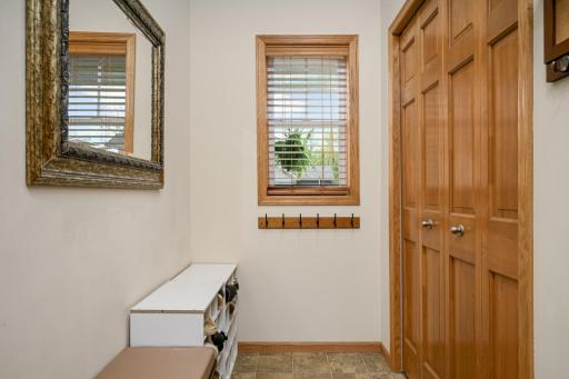 Mudroom off of the garage with additional closet.