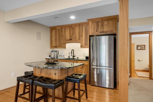 Granite counters and stainless steel refrigeratorl.