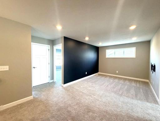 YES! There is a second living space located in the upper level! This wonderful size loft opens up a variety of uses from a place for the kids, another den for TV or a library to study! The TV mount is included.
