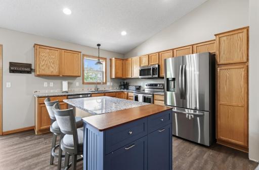 Stainless steel appliances and center island