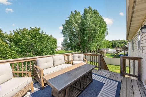 Spacious deck overlooking private backyard