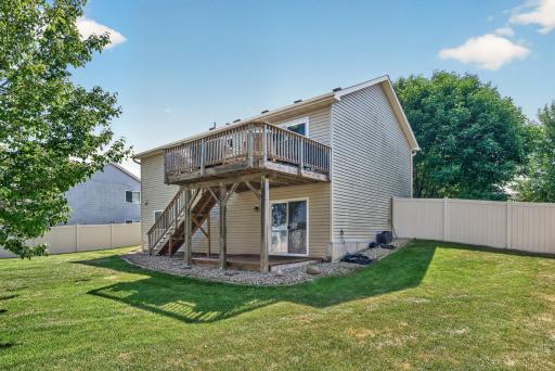 Spacious deck overlooking backyard