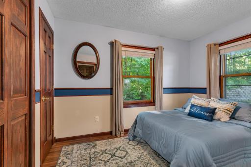 The fourth main level bedroom offering unique finishing touches. Are you ready for lake life?