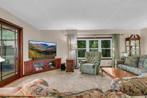 Large living room with plenty of room to entertain family and friends. Just off to the left is the 4 season porch.