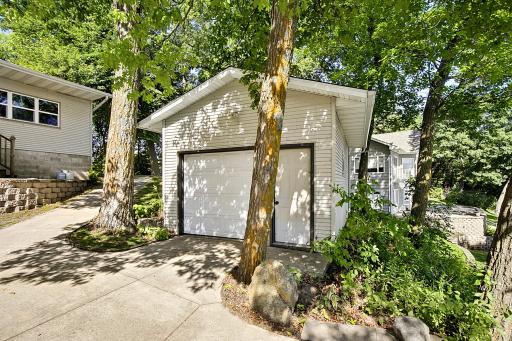 Lakeside one car garage with service door. Great amount of storage for all your lake toys or golf cart and ranger needs.