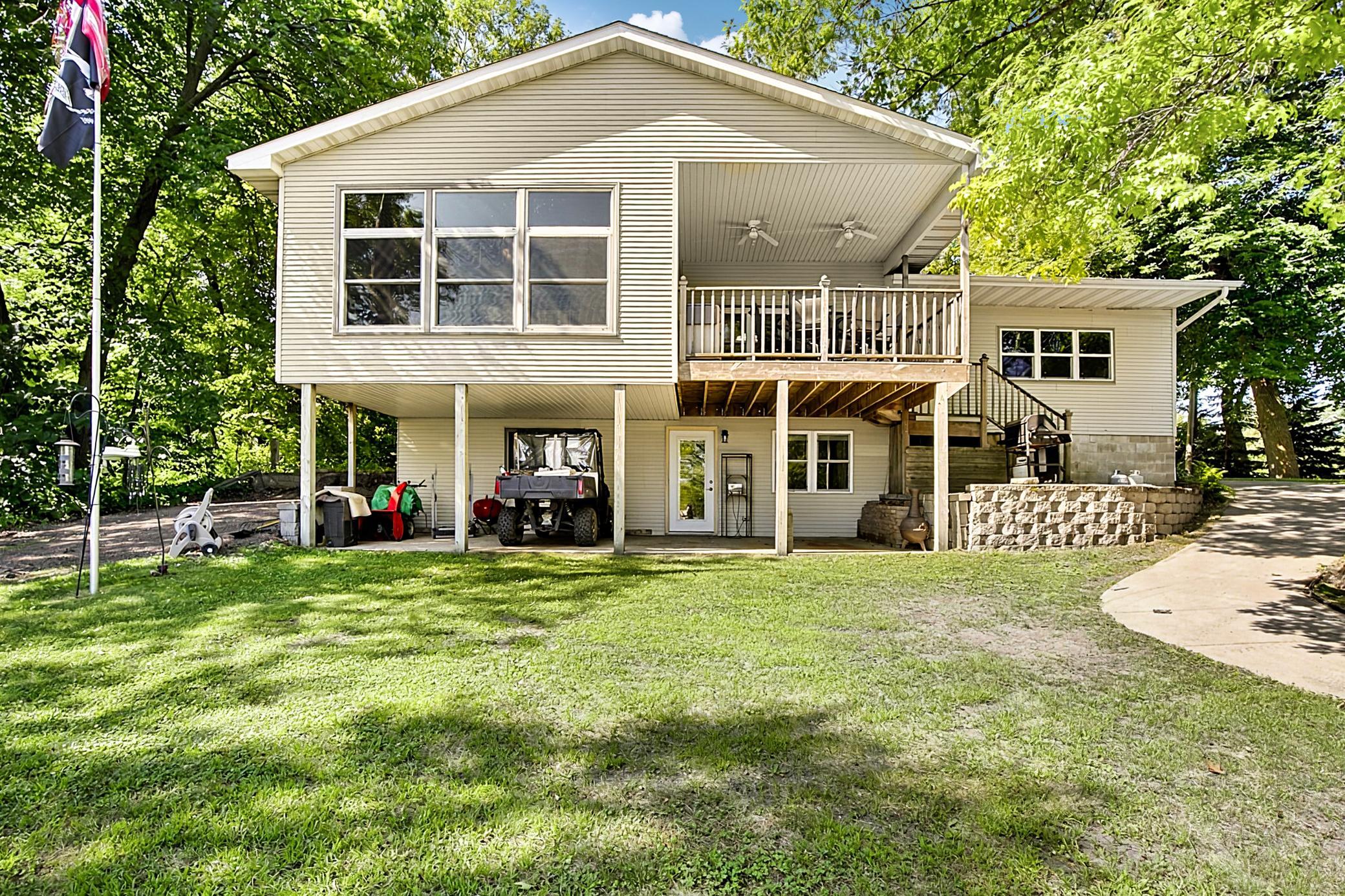 Wow! a 4 season porch, covered deck and covered patio are hard to find on the lake. Plus the level yard right out from the house to enjoy games or fires. This place has it all!