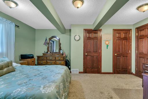 Wake up to the best lake views around. Lower level bedroom is large and offers three closets for all your clothing and storage needs.