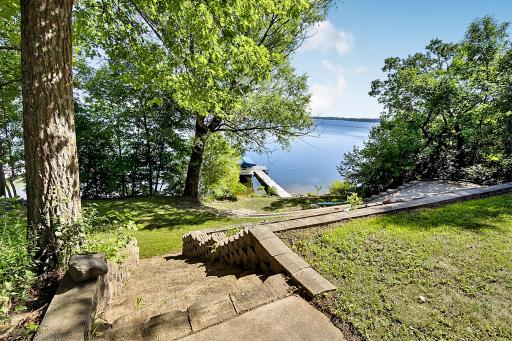 This lot has been terraced with retaining wall making accessing the lake effortless. You cant take the stairs or take the golf cart path.