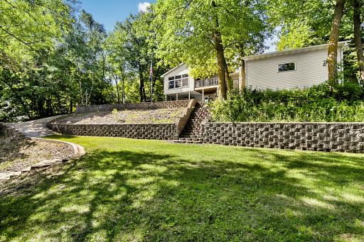 Imagine some easy to care for perennials in this terraced area making landscaping maintenance a breeze. Another great flat area to sit under the shade tree and enjoy the lake.