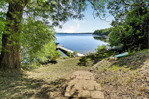 Steps to the lake or to the left of them you can drive your golf cart right down to the water's edge.