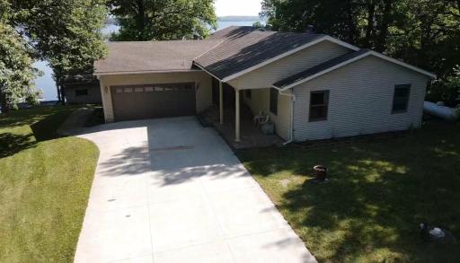 Newer concrete driveway, well maintained property and a great lake to top it off. Who's ready to enjoy?