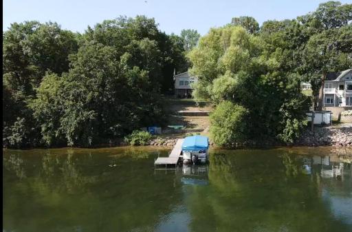 Who wants to come enjoy the lake? With 100 ft of lakeshore and mature trees, you will have tons of privacy while enjoying all lake life has to offer.