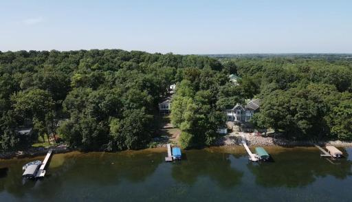 This property offers plenty of privacy sitting at your lakeshore.