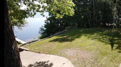 Another shot of the level backyard. This is a large space that gives the option to enjoy the lake right from your patio.