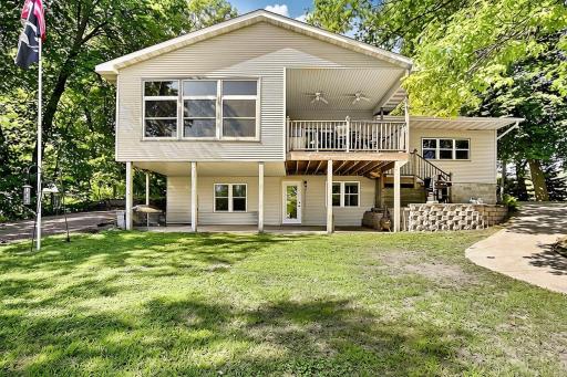 Wow! a 4 season porch, covered deck and covered patio are hard to find on the lake. Plus the level yard right out from the house to enjoy games or fires. This place has it all!