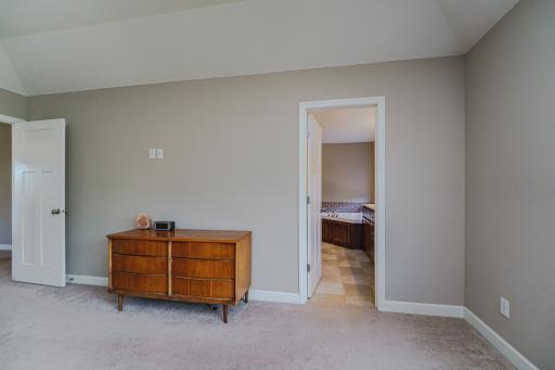 The primary bedroom has a tech tube behind the wall.