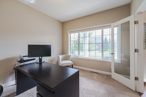 The windows in the office overlook the front porch.