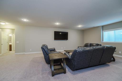 The lower level bath is convenient for guests and family nights at home.