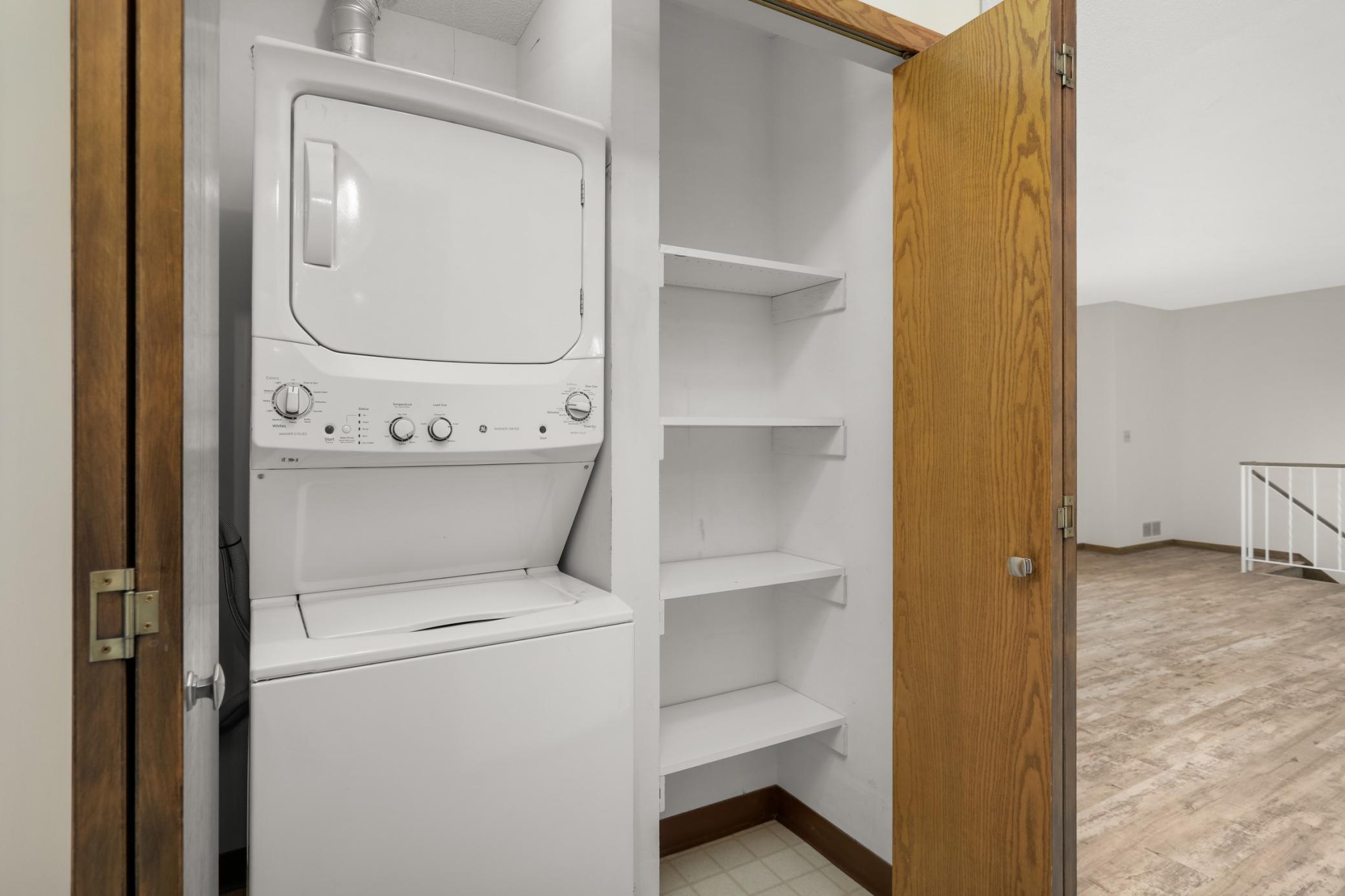 The laundry space is located in the hallway. The washer/dryer combo was purchased in 2025.