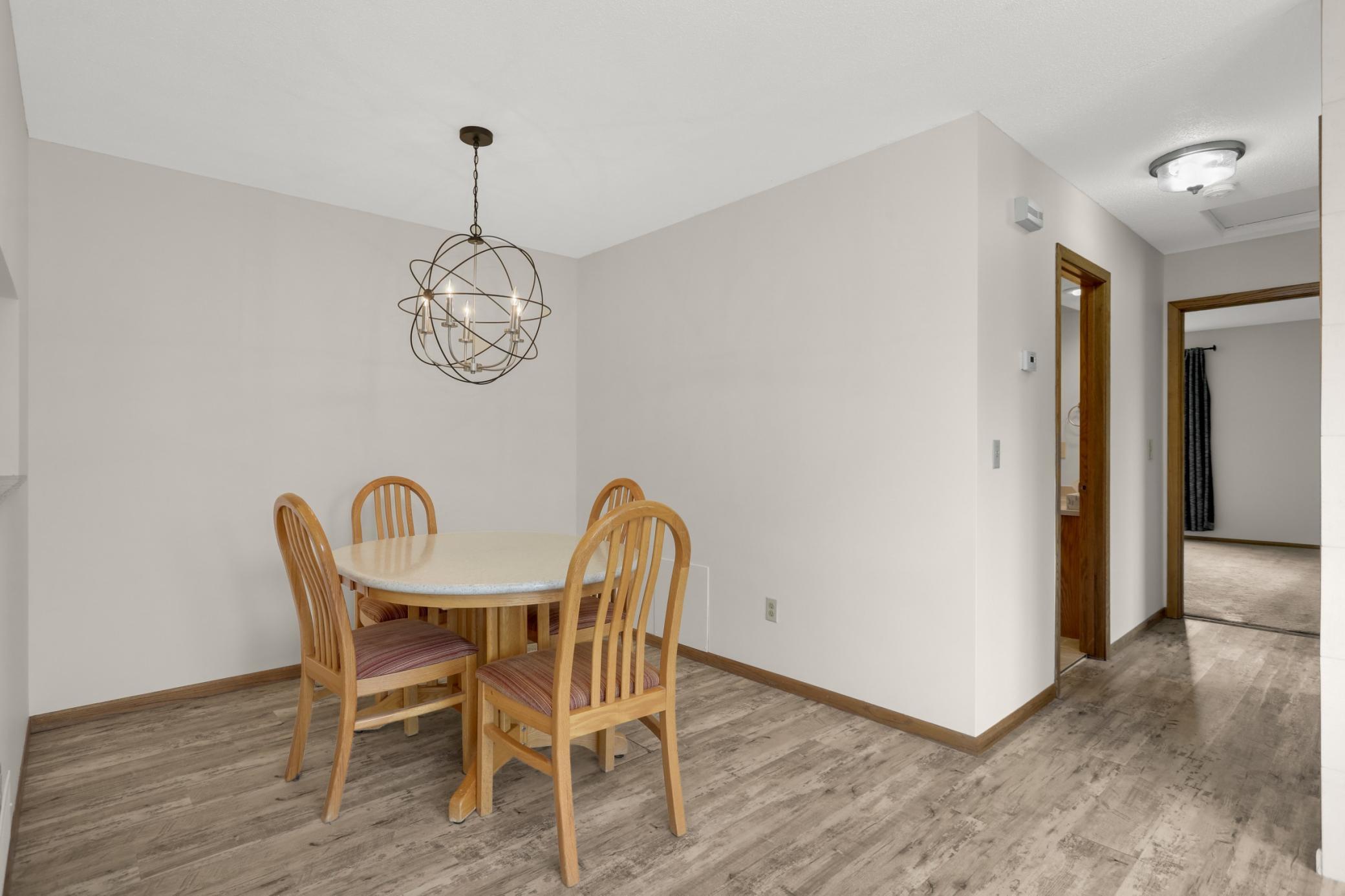 This view shows the floor layout. The primary bedroom is down the hall and the bathroom is the first door on the left.