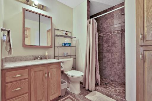Primary Bedroom 3/4 Bath with Updated Tiled Shower