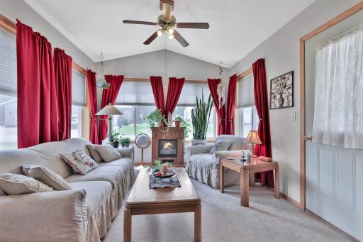 Cheery Sunroom with exit to the back patio