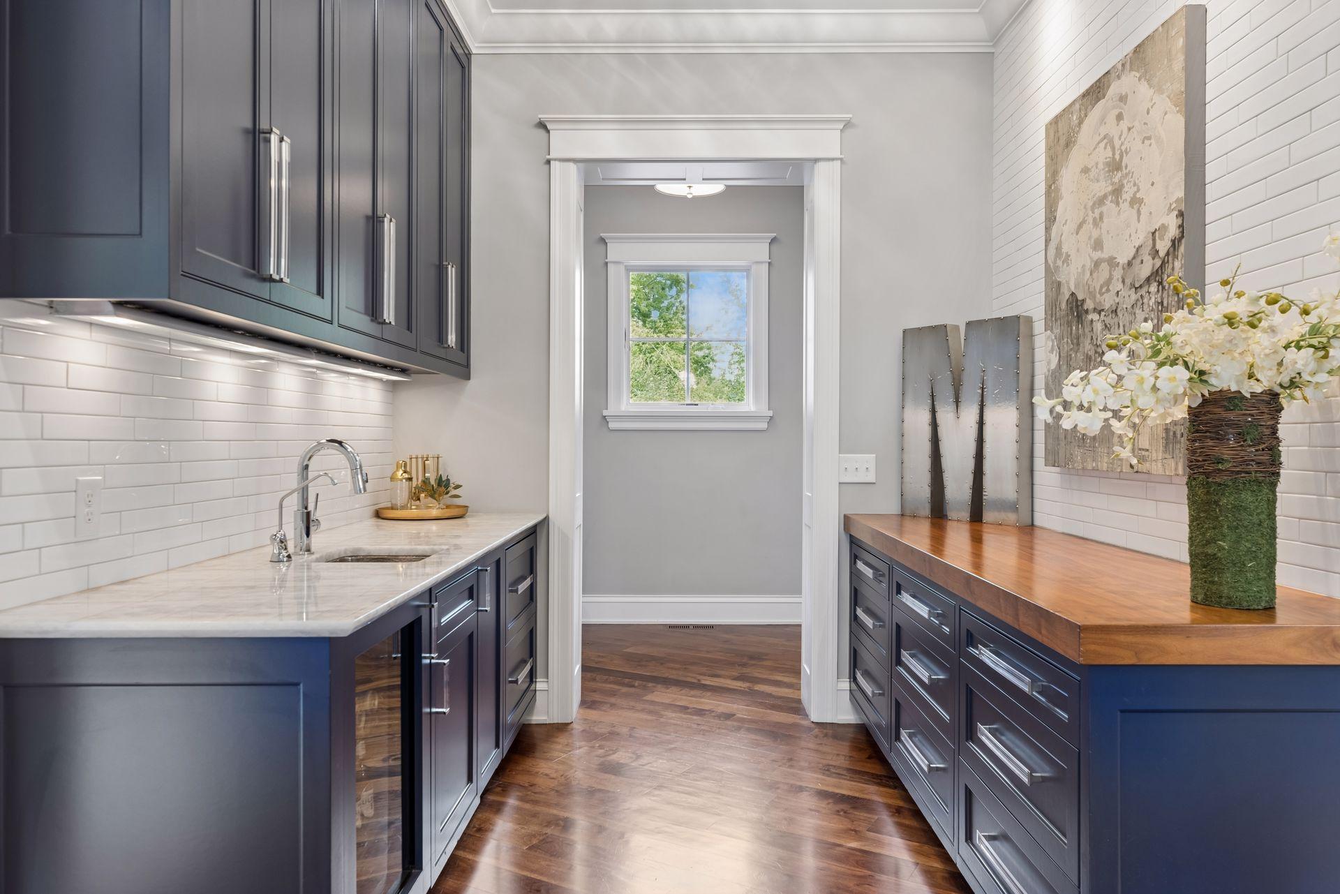 Butler's Pantry w/ Beverage Fridge & Sink